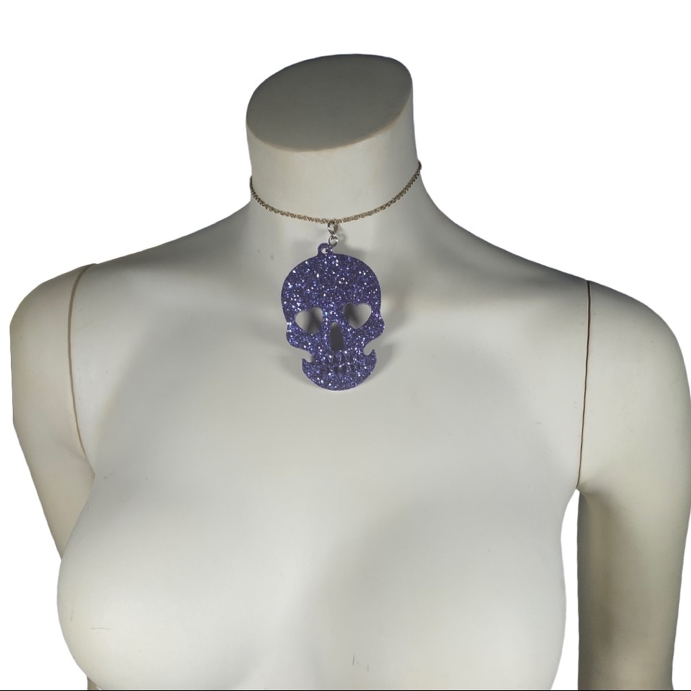 Purple glitter resin skull pendant